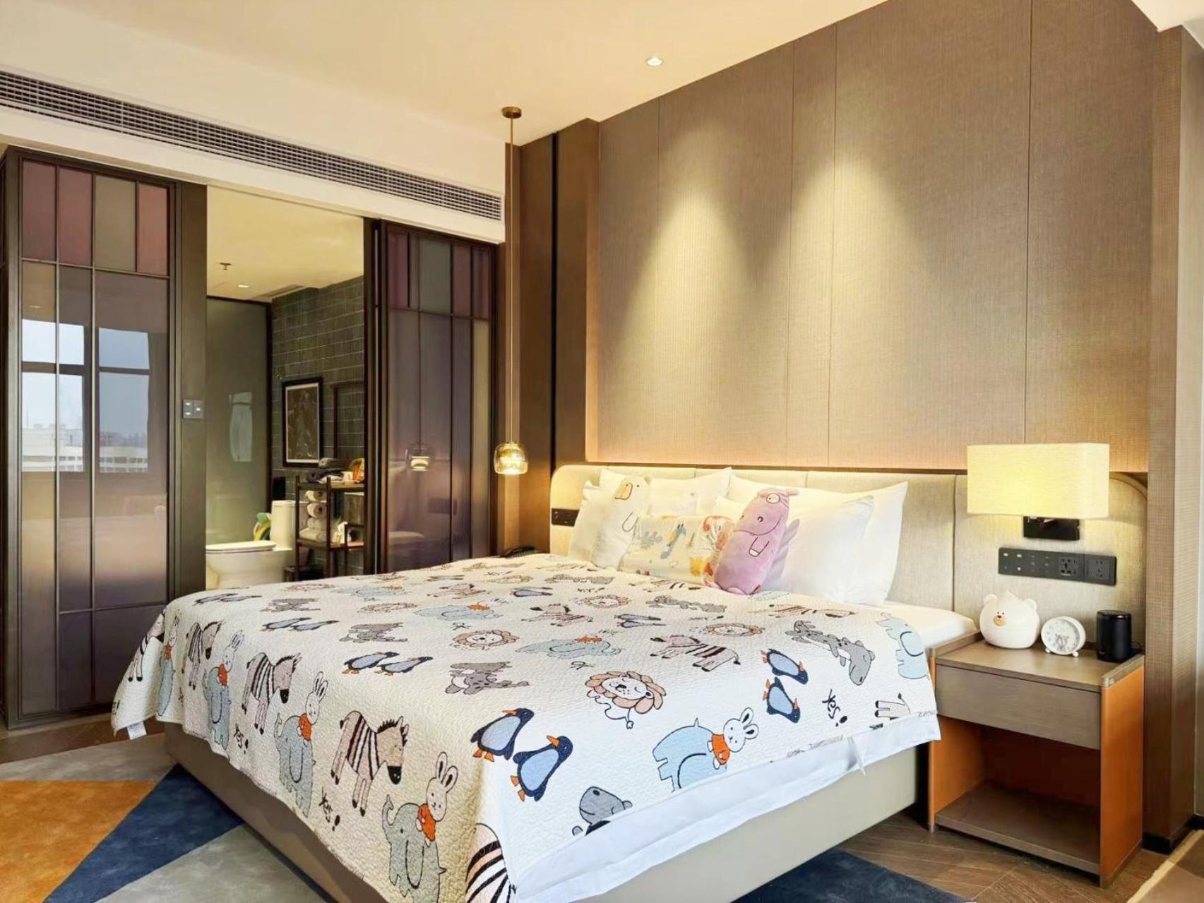 Guangzhou Baiyun Hotel Eksteriør bilde A bedroom at the hotel